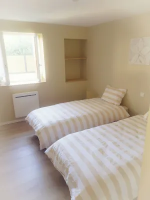 In a peaceful village, superb 2-bedroom apartment with private courtyard