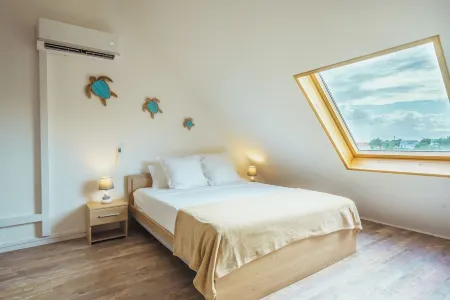 Charming duplex with sea view, swimming pool and close to the beach - Le Goyave Отели в г. Мар Гаяр