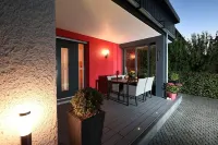 New, modern equipped apartment with lake view in the Vulkaneifel Hotel a Schalkenmehren