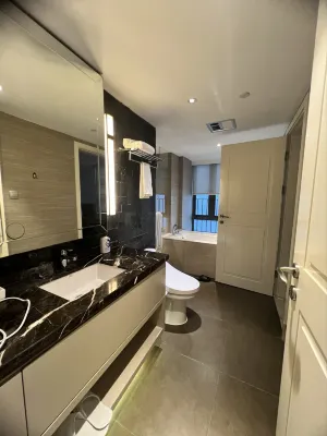 Luxe·Eastern Joy Suites Hotel Kamar Photos