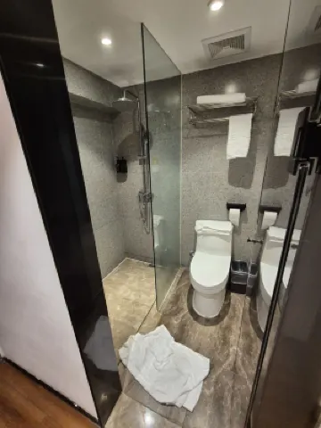 Liangzhi Huipin Hotel (Friendship Commercial Plaza Branch, Qilou Old Street, Haikou) Zimmer Photos