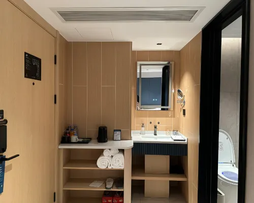 Elong Anyue Hotel (Zhangjiagang Mambat Plaza Yangshe Old Street) الغرف Photos