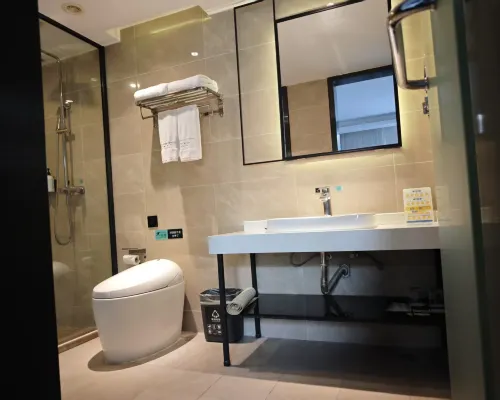 Xana Lite Hotelle (Jiangmen Wuyi University Lihe Plaza） Номера Photos