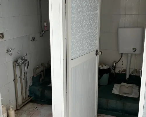 Lijiang Qishangju Youth Hostel الغرف Photos