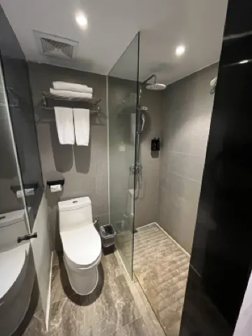 Liangzhi Huipin Hotel (Friendship Commercial Plaza Branch, Qilou Old Street, Haikou) Zimmer Photos