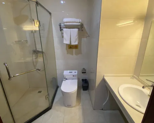 Hua Sheng Hotel Rooms Photos