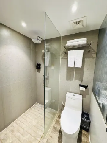 Liangzhi Huipin Hotel (Friendship Commercial Plaza Branch, Qilou Old Street, Haikou) Zimmer Photos