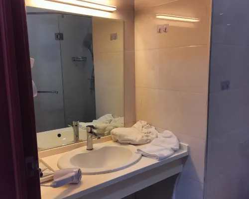 Hua Sheng Hotel Rooms Photos