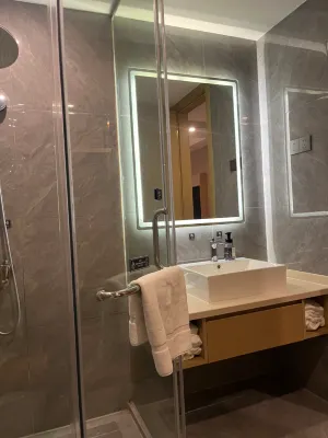 Pu Jue International Hotel (Shanghai Songjiang Xin Qiao) Номера Photos