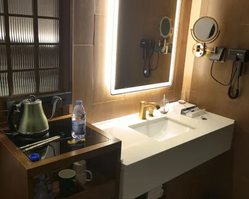 ZK Hotel (yizhuangjingjikaifaquMaqiqiao Branch) Zimmer Photos