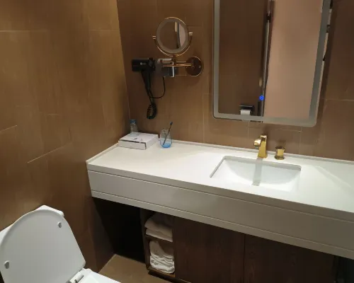 ZK Hotel (yizhuangjingjikaifaquMaqiqiao Branch) Zimmer Photos