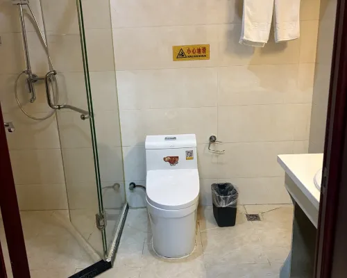Hua Sheng Hotel Rooms Photos