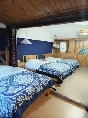 Delamu Youth Inn Zimmer Photos