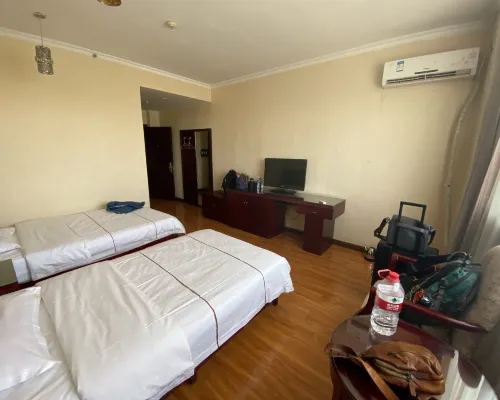 Jinglong Hotel Zimmer Photos