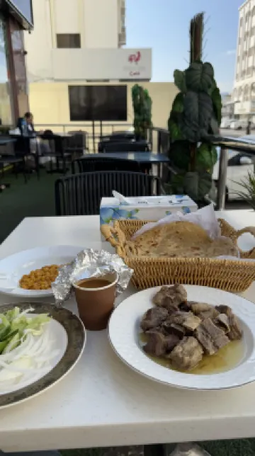 فندق أمواج الدولي تناول الطعام Photos