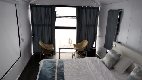 Deshell Turtle Camp Hotel (Daqi Xiling Snow Mountain Branch) Zimmer Photos