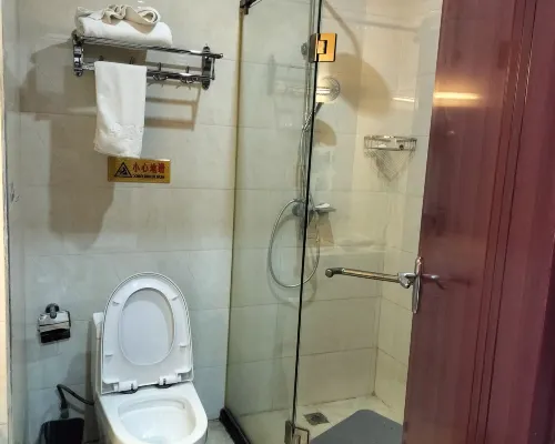 Hua Sheng Hotel Rooms Photos