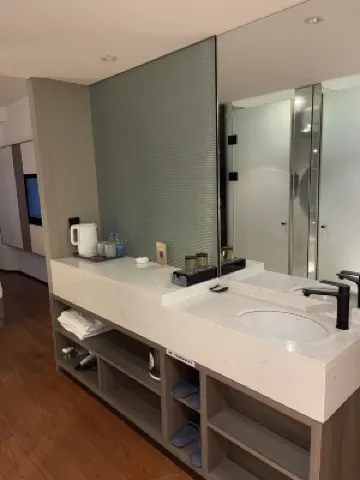 Liangzhi Huipin Hotel (Friendship Commercial Plaza Branch, Qilou Old Street, Haikou) Zimmer Photos