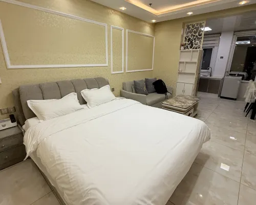 Qingyun Boutique Vacation Apartment (Weihai High-Speed Railway Station Hanlefang) Zimmer Photos