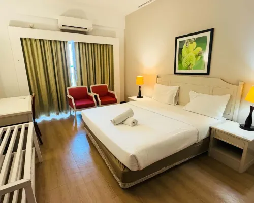 Rainbow Paradise Beach Resort by LWE Rooms Photos