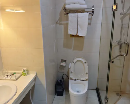 Hua Sheng Hotel Rooms Photos