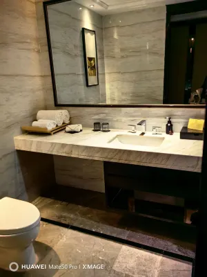 Wellton International Hotel Rooms Photos