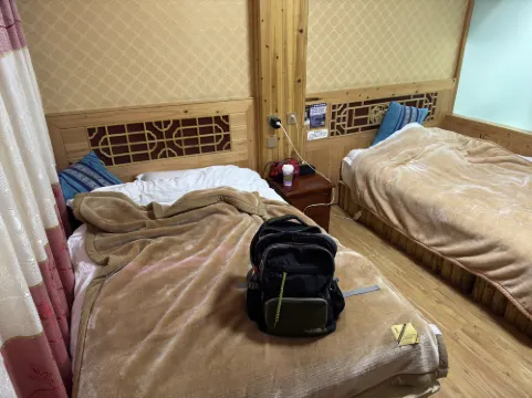 Delamu Youth Inn Zimmer Photos