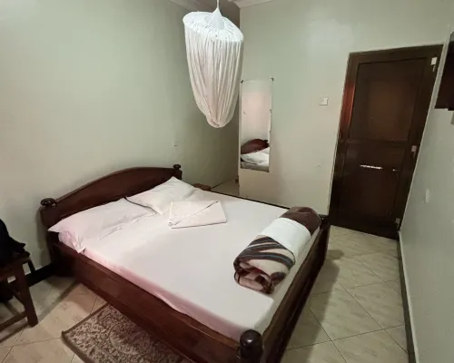 Raha Leo Inn Phòng Photos