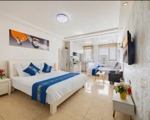 Qingyun Boutique Vacation Apartment (Weihai High-Speed Railway Station Hanlefang) Zimmer Photos