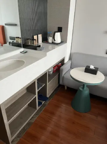 Liangzhi Huipin Hotel (Friendship Commercial Plaza Branch, Qilou Old Street, Haikou) Zimmer Photos