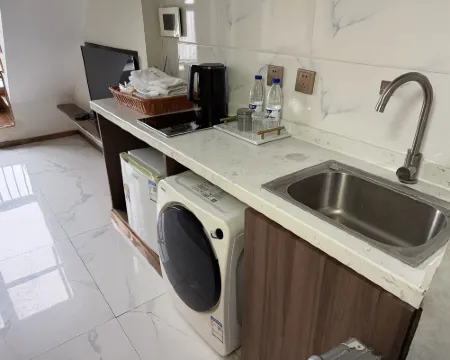Yunyou High-End LOFT Cinema Hotel Apartment (Jiu Yan Qiao Branch) Zimmer Photos