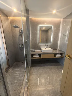 Pu Jue International Hotel (Shanghai Songjiang Xin Qiao) Phòng Photos