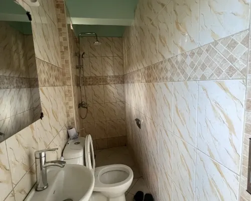 Raha Leo Inn Habitaciones Photos