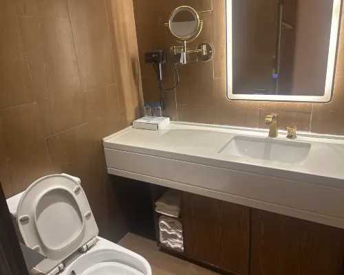 ZK Hotel (yizhuangjingjikaifaquMaqiqiao Branch) Zimmer Photos