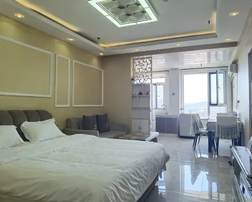 Qingyun Boutique Vacation Apartment (Weihai High-Speed Railway Station Hanlefang) Zimmer Photos