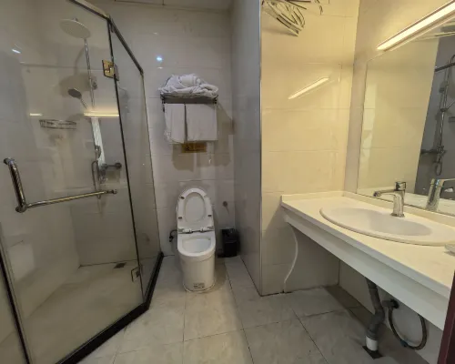 Hua Sheng Hotel Rooms Photos