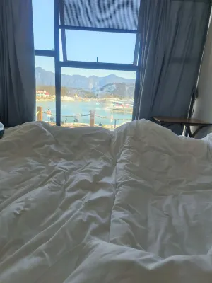 Deshell Turtle Camp Hotel (Daqi Xiling Snow Mountain Branch) Zimmer Photos