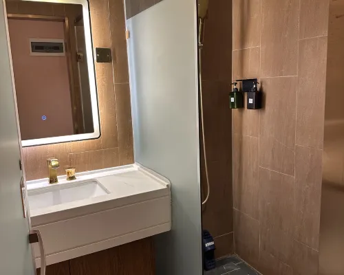ZK Hotel (yizhuangjingjikaifaquMaqiqiao Branch) Zimmer Photos