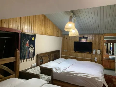 Delamu Youth Inn Zimmer Photos