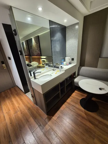 Liangzhi Huipin Hotel (Friendship Commercial Plaza Branch, Qilou Old Street, Haikou) Zimmer Photos