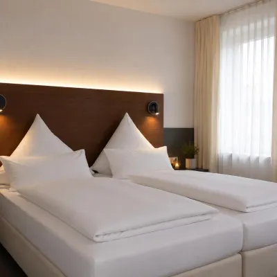Hotel am Hirschgarten Отели рядом с достопримечательностью «Плининген»