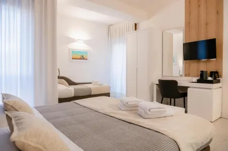 Lo Studio di Viale Lo Re Camere & Caffe’