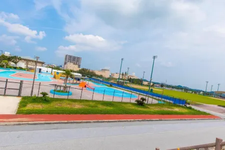 CONDOMINIUM HOTEL Riyuka in KADENA 1 Отели рядом с достопримечательностью «望水亭 [Awase Comprehensive Park]»