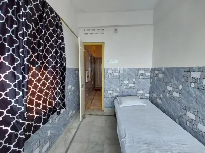 Nirman Beach Homestay Отели в г. 