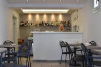 Alexandros Apartments - bar