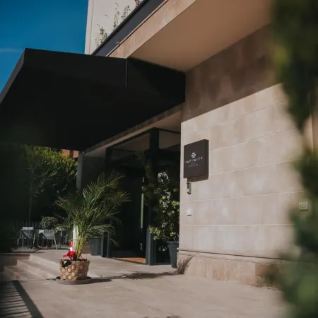 Infinity Hotel & More