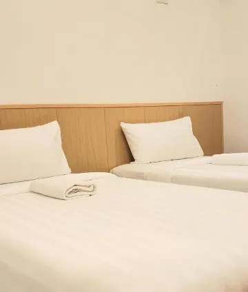 ห้องเตียงแฝดพร้อมห้องน้ำส่วนตัว