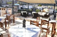 Monte Cappa Cave House Hotels in Karlik Koyu