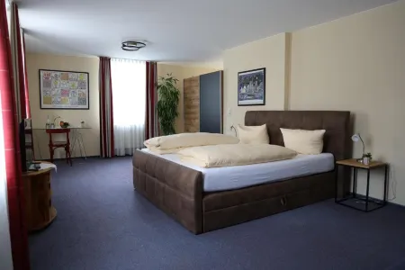 Gasthaus & Pension Mohren Отели в г. Ильмензее