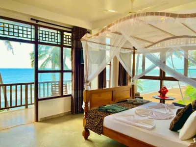 Top Secret Beach Hotel Отели рядом с достопримечательностью «Abayasekararamaya Temple»